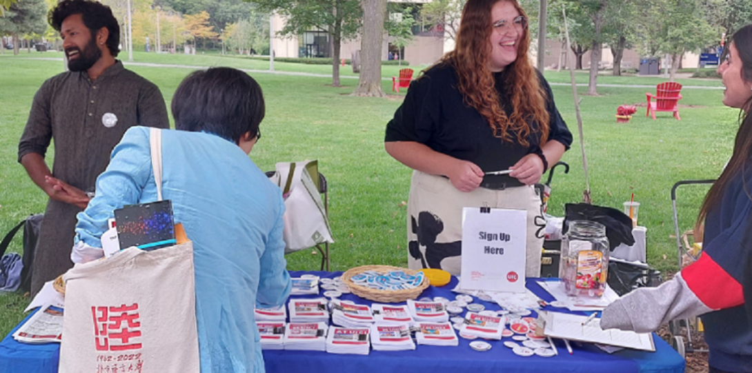 UIC Involvement Fair 2023: LCLC's table with students and staff alike