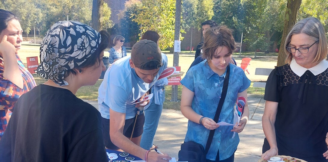 volunteers for LCLC table at UIC Open House 2024