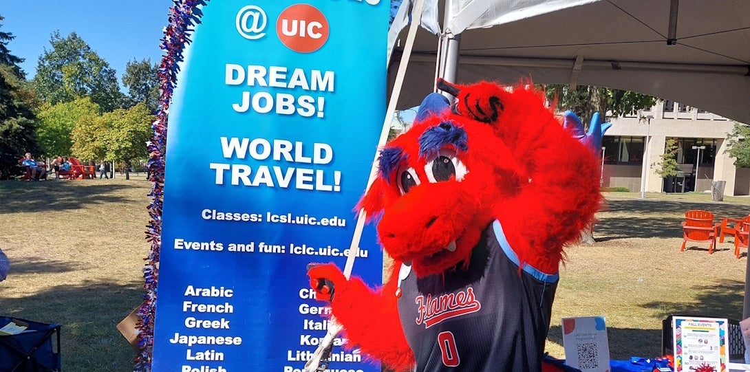 Sparky the Dragon at the LCLC table for UIC Open House 2024