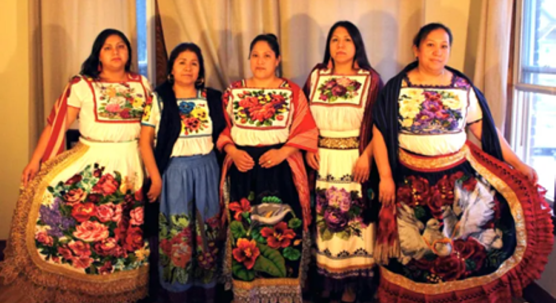 Women from Cheranástico, Michoacán, wearing traditional attire from the region.