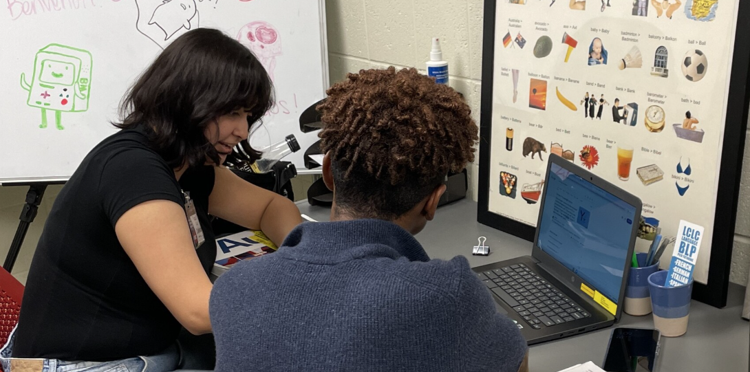 Peer Tutor Celeste helps a tutee learn Spanish